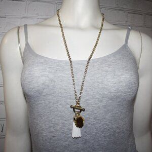 Beautiful gold toggle necklace with white tassel 30"